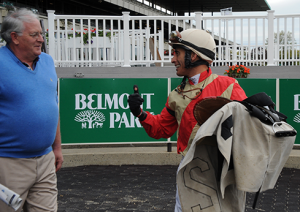 Trainer Jimmy Jerkens and Hall of Fame jockey John Velazquez celebrate Juba's Belmont Park win.