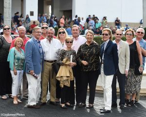 Life On Top breaks his maiden at Gulfstream Park. Thoroughbred racing partnership in the paddock.