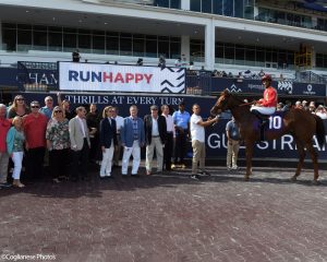 Life On Top breaks his maiden at Gulfstream Park. Thoroughbred racing partnership in the winner's circle.