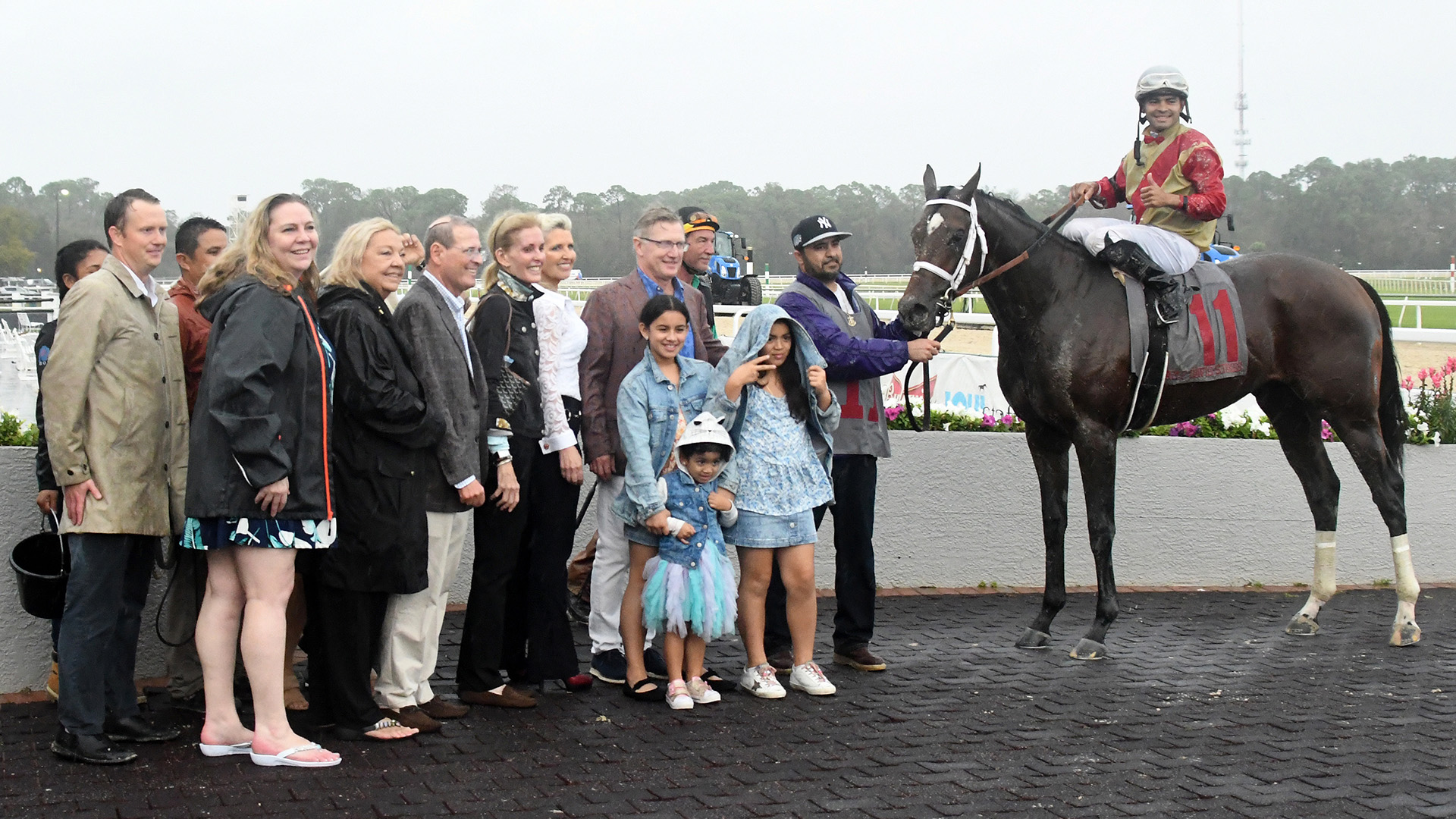 Litigate (Blame - Salsa Diavola, by Mineshaft) with members of the Elmont LLC Thoroughbred racing partnership after taking the G3 Sam F. Davis at Tampa Bay Downs for Centennial Farms.